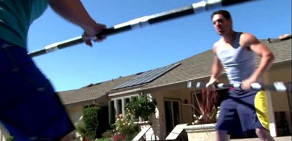  Gay muscular jocks sword fighting by the pool